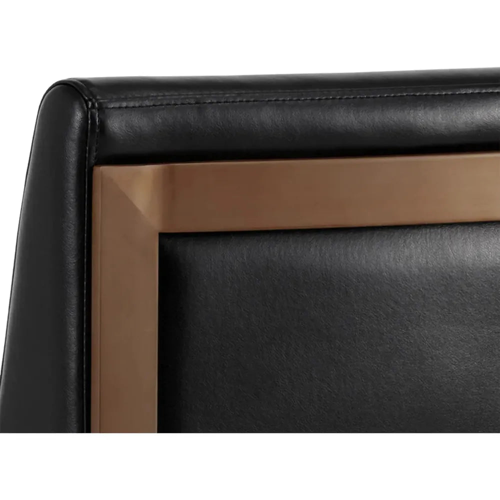 Additional view of Dean Counter Stool in black and antique brass, featuring smooth upholstery finish and a sled base.