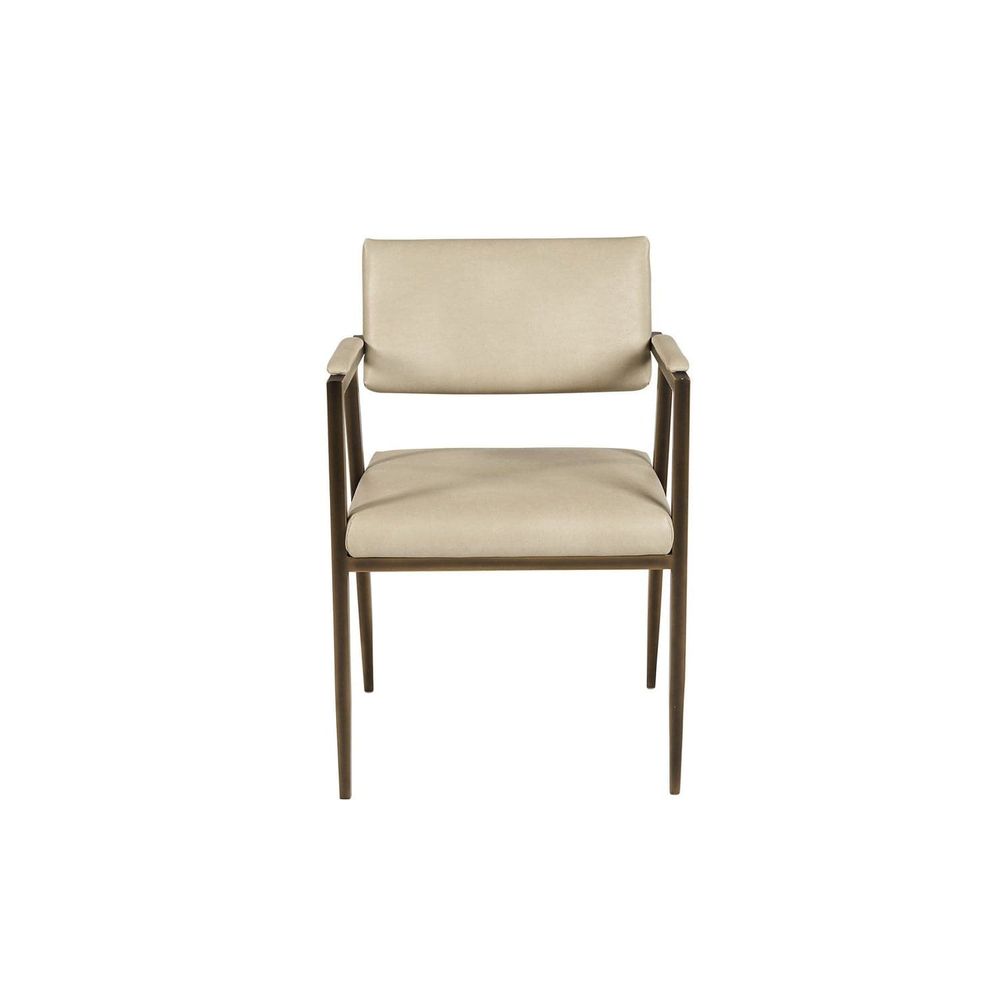 Ventouz Armchair, shown in cream and beige with vegan leather, metal, and fixed arms.