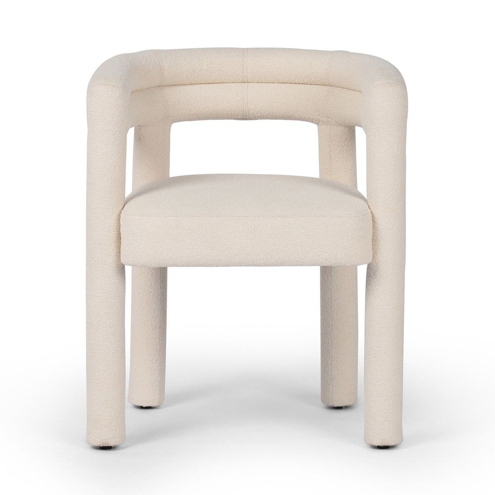 Tacova Dining Chair, shown in cream and off-white with bouclé fabric, upholstered frame, and fixed continuous arms.