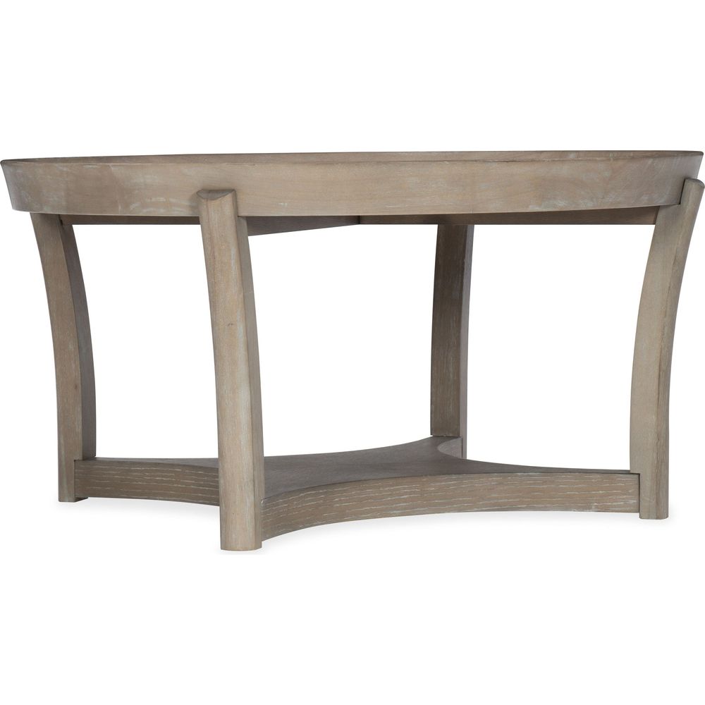 Alternate view of Affinity Round Cocktail Table, featuring distressed, wood, and integrated lower shelf.