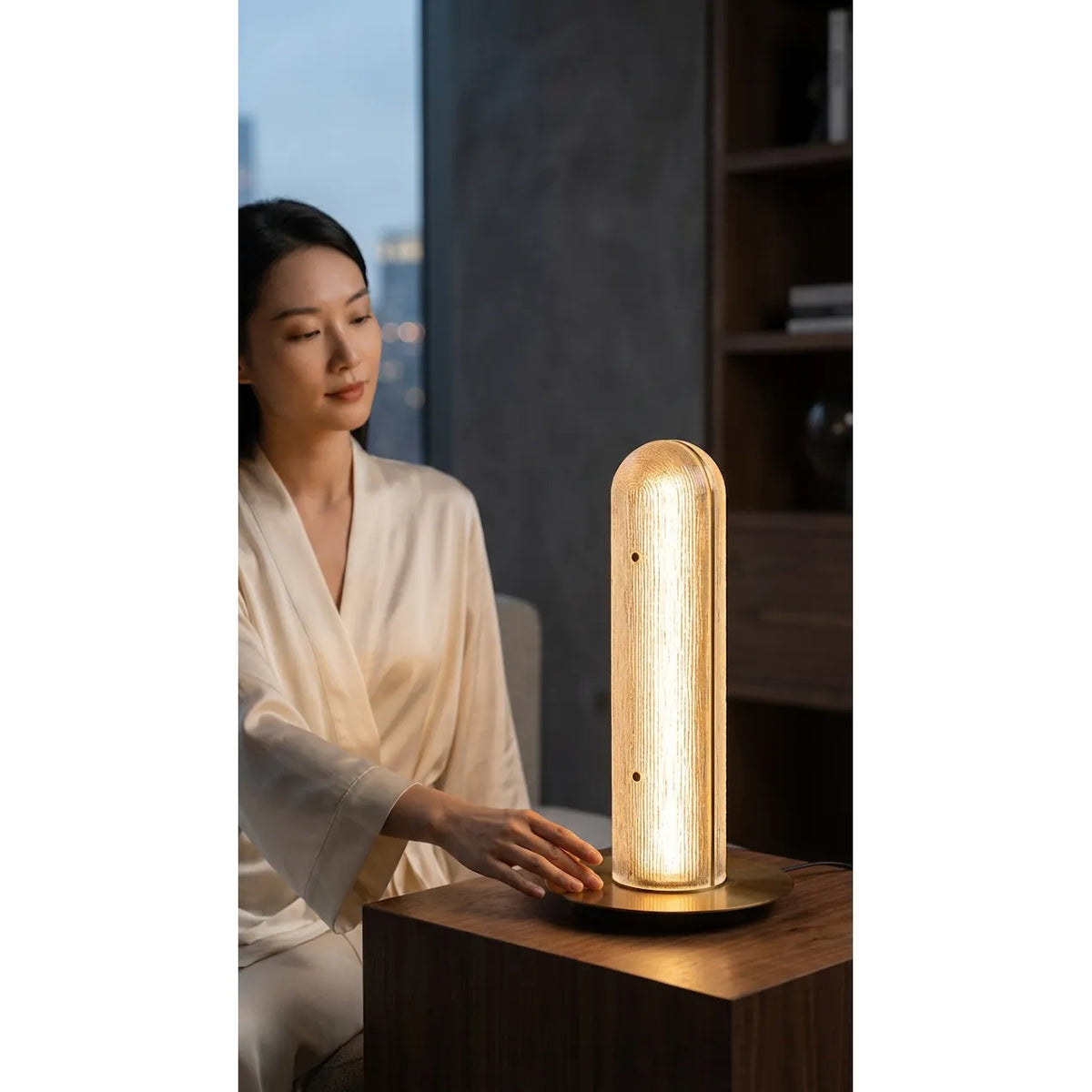 Additional view of Zalla Tubular Table Lamp in warm amber and champagne gold.