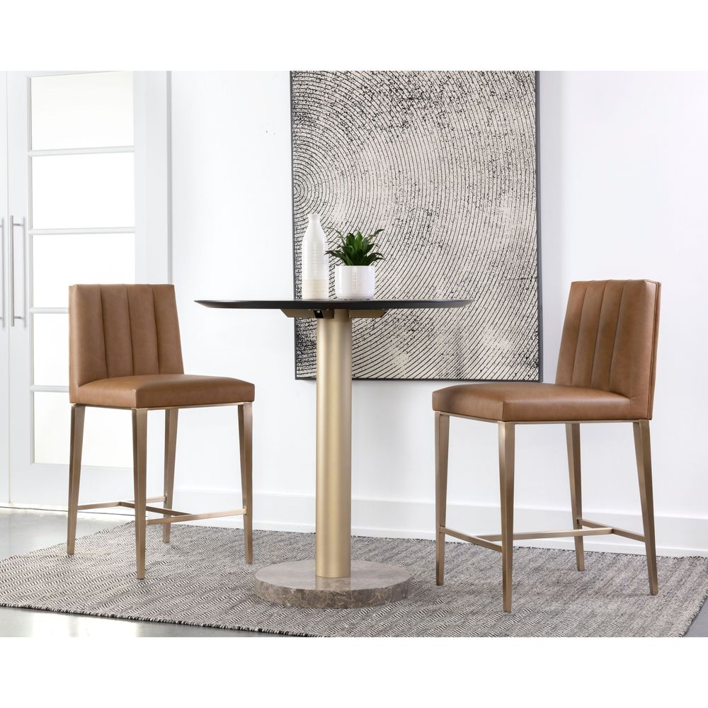 Additional view of Wilbur Counter Stool in cognac and tan, featuring brushed finish and integrated footrest.