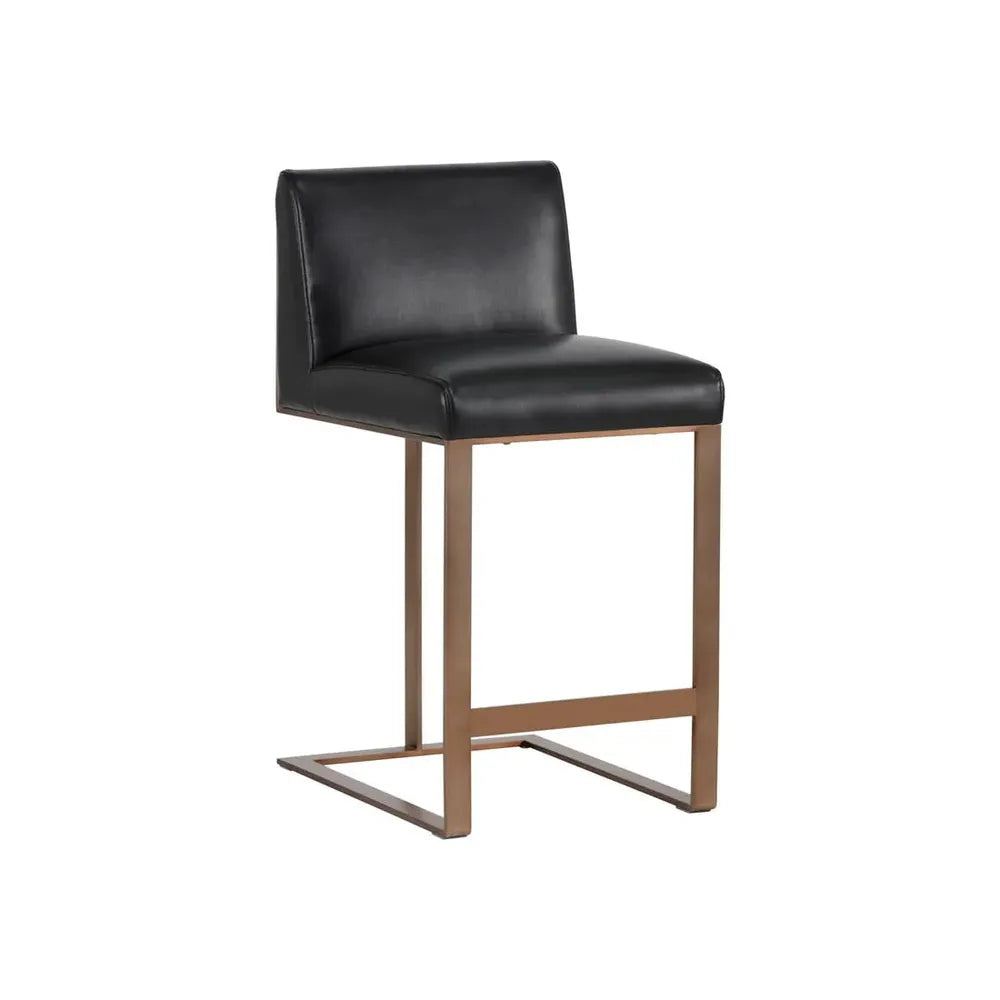Dean Counter Stool, shown in black and antique brass with leather, metal, and a sled base.