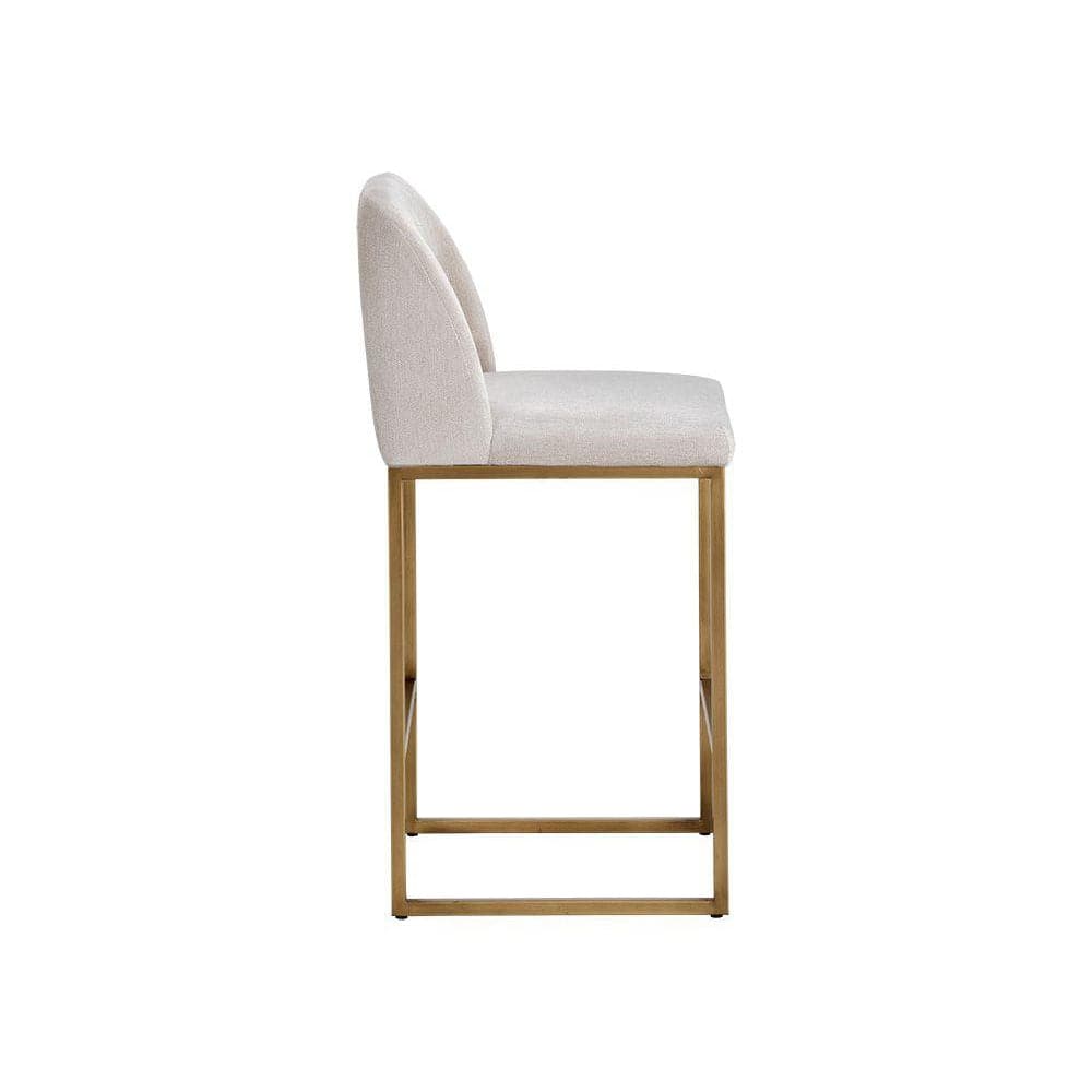 Additional view of Nevin Counter Stool in light beige and champagne gold, featuring a counter-height seat.