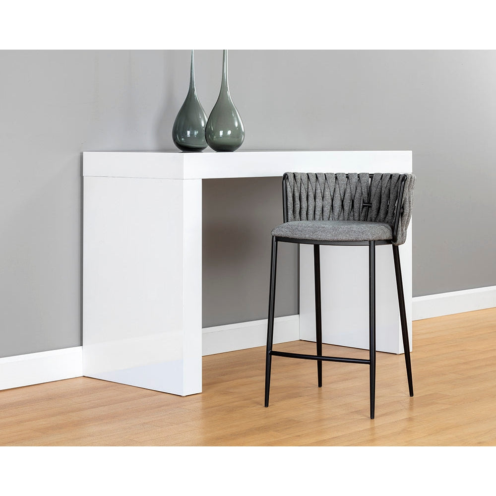 Additional view of Sarai Counter Stool in grey and black, featuring textured woven upholstery and fixed four-leg base.