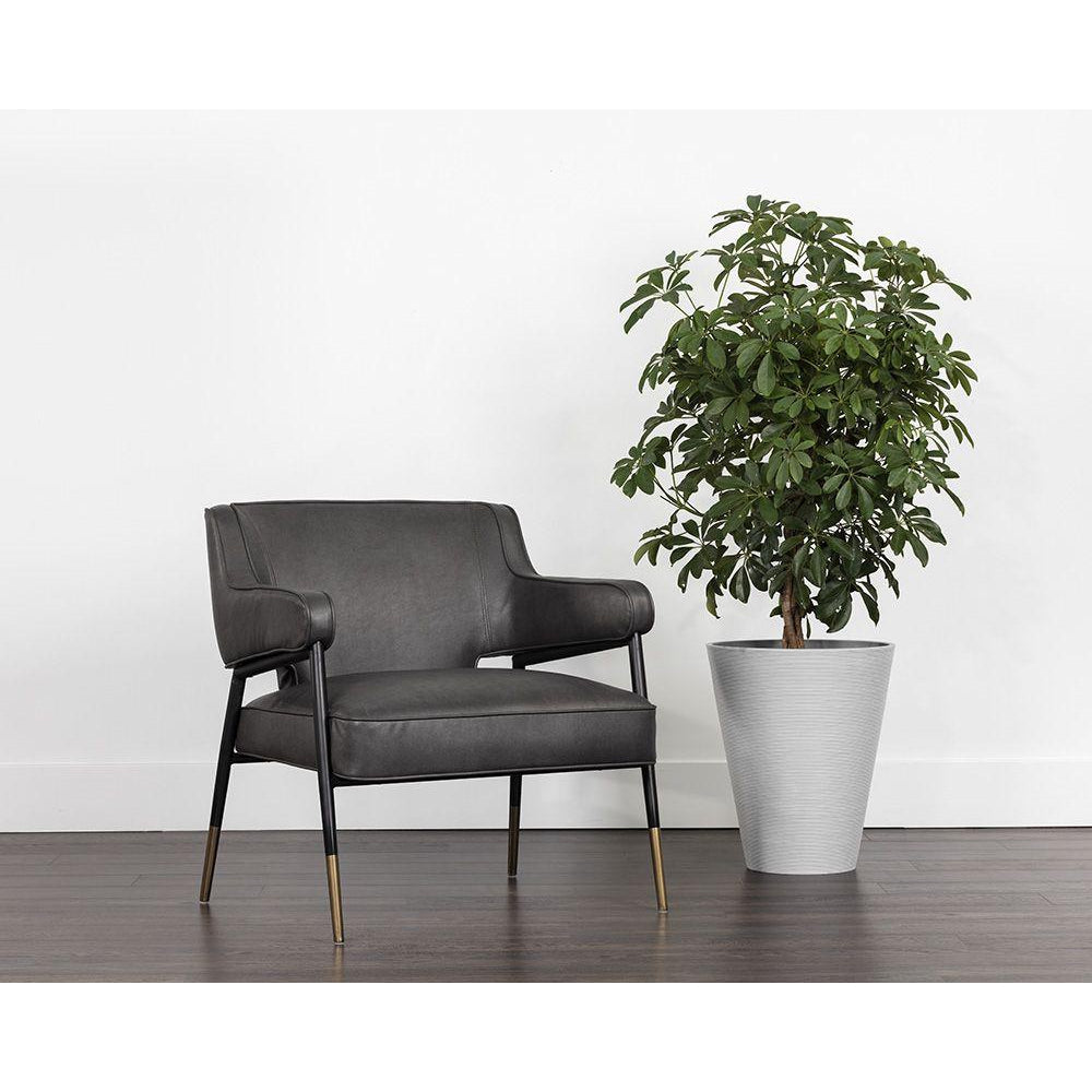 Additional view of Derome Lounge Chair in charcoal gray and black, featuring matte upholstery finish and fixed arms.
