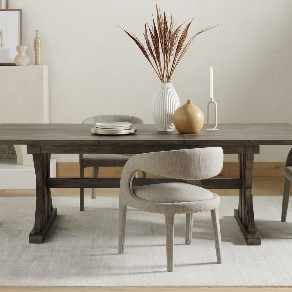 Additional view of Hayes Dining Chair in light gray and greige, featuring matte finish and integrated continuous fixed arms.