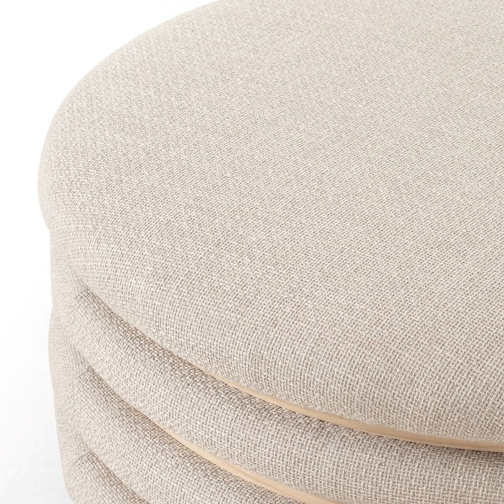 Additional view of Astra 36" Round Coffee Table Ottoman in beige and light natural wood.