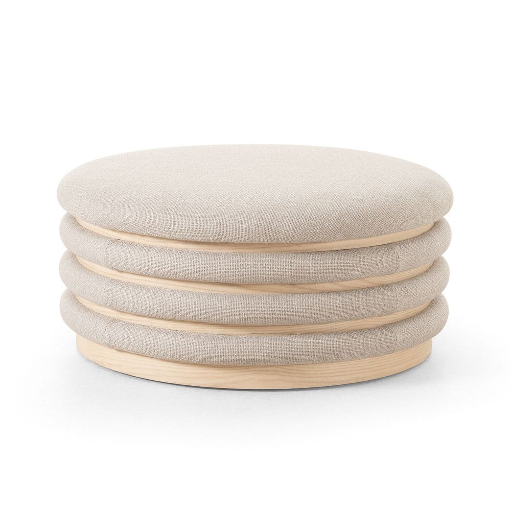 Astra 36" Round Coffee Table Ottoman, shown in beige and light natural wood with fabric and wood.