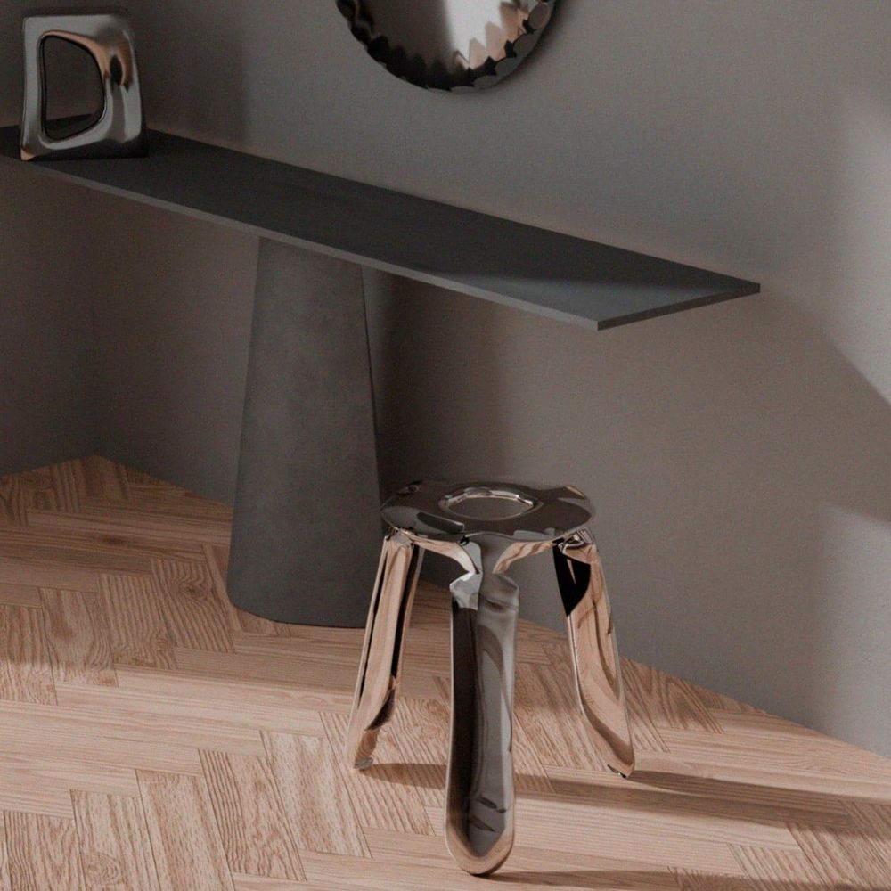 Additional view of Stainless Balloon Stool in silver and chrome, featuring mirror-polished finish and four fixed legs.