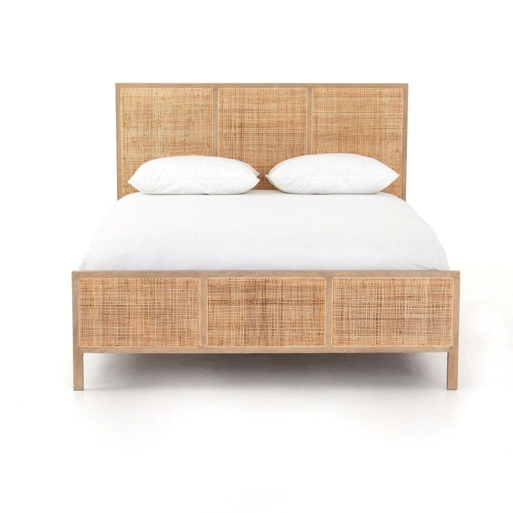 Loraine Bed, shown in natural light wood and honey cane with mango wood, cane rattan, and a platform bed frame.
