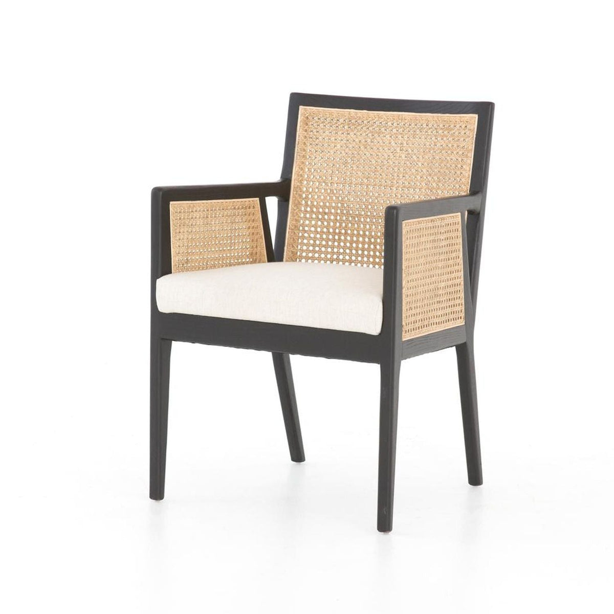 Antonia Cane Dining Arm Chair styled beside a cabinet; other furniture and accessories not included