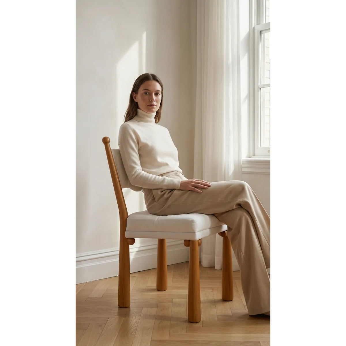 Additional view of Lisa Dining Side Chair in warm honey oak and ivory white, featuring armless open sides.